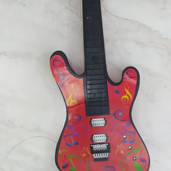 Tedi Discount Tekstil Mağazacılık Kalitesiz Oyuncak Gitarı İade Edemedim!
