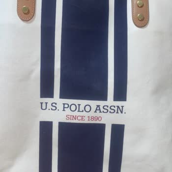 U.S. Polo Assn. U. S Polo Çanta Rengi Soldu Ve Güneş Lekeleri Oluştu Kalitesiz