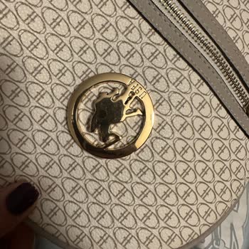 U.S. Polo Assn. Çanta Kenarı Kıyafeti Boyuyor