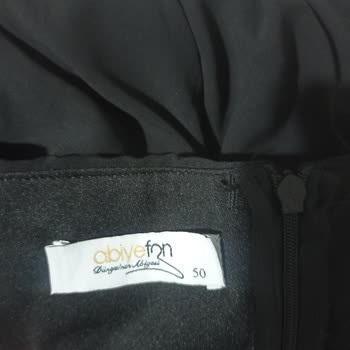 Abiyefon Abiye Elbiseye Yanlış Etiket Basılması