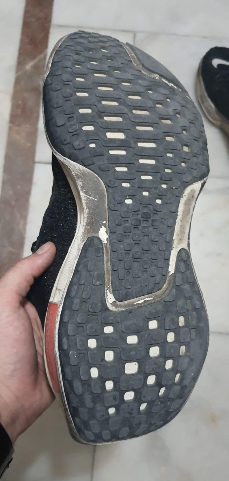 tearing nike shoes