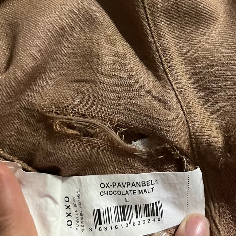 Oxxo Keten Pantolon Yırtılması