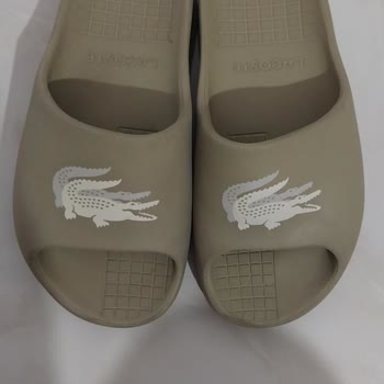 Lacoste Sandals Shrunk and Caused Pain