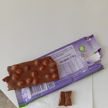 Шоколад Milka с гнилыми орехами