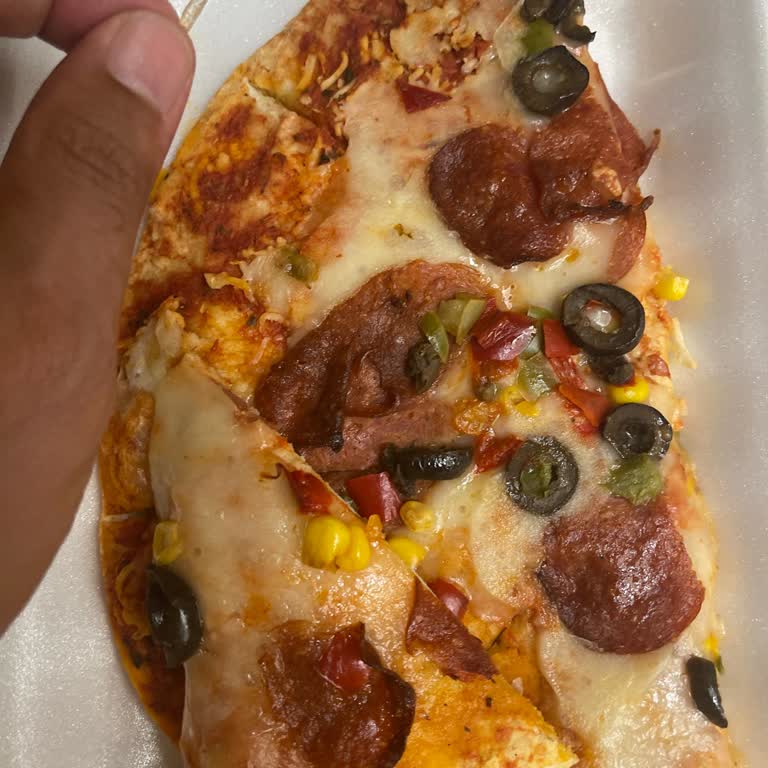 Kayseri Migros'tan Alınan Pizzada Cam Parçası Çıktı!