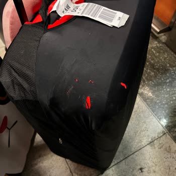 Luggage Protector Torn During Qatar Airways Flight and No Response from Customer Service