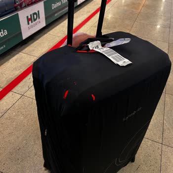 Luggage Protector Torn During Qatar Airways Flight and No Response from Customer Service