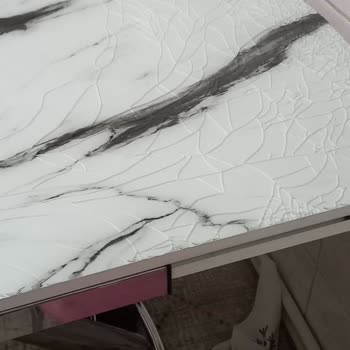 STM Mağazacılık Camlı Mutfak Masasının Camının Parçalanması