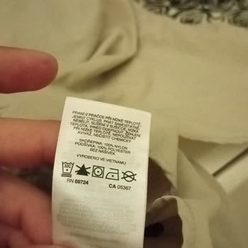 Problema de planchado con camisa Columbia y falta de soporte