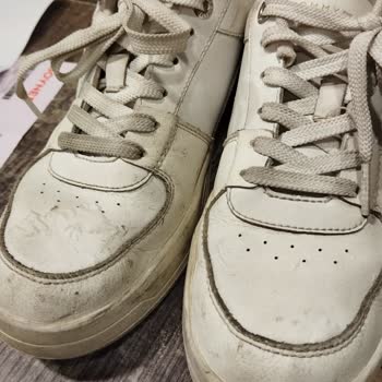 Tommy Hilfiger Zapatos Problema de Burbujas en el Cuero