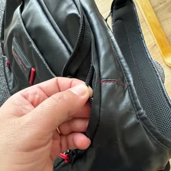 Problema con la Reparación y Experiencia en Tienda Samsonite Backpack