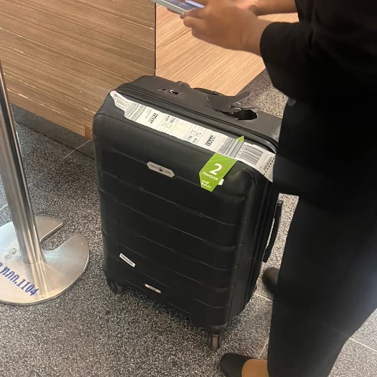 Etihad Havayolları Transfer Yolculukta Valiz Kırılması