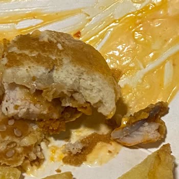 Encontré una uña de pollo en mi Zinger Burger de KFC