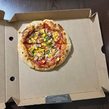 Pizza Hut Pizzas Más Pequeñas de lo Anunciado