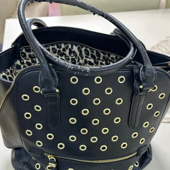 Nine West - Problemas con el bolso y los zapatos