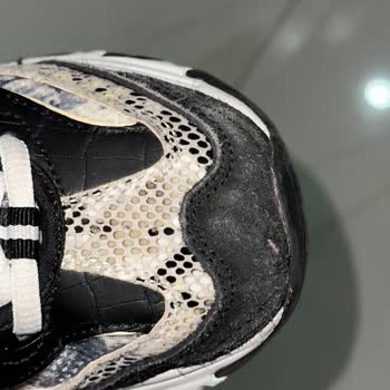 Skechers D'Lites Shoes Developed a Hole After Less Than a Year of Use