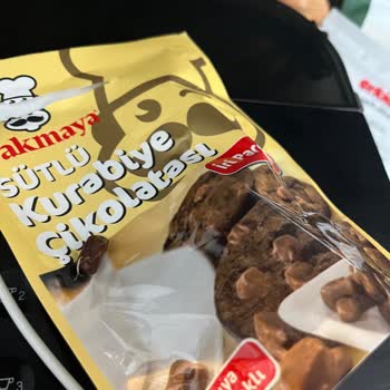 Pakmaya Sütlü Kurabiye Çikolatasının İçinde Plastik Parçalar
