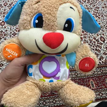 Fisher-Price Tehlikeli Bebek Oyuncağı: Yanmış Pil Bölmesi