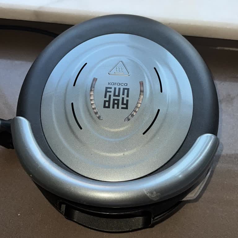 Karaca Züccaciye Waffle Makinesinin Plakasını Tutan Mandalı Eridi