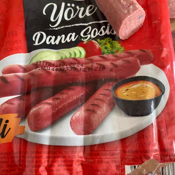 Maret Dana Sosisin İçinden Çıkan Mavi Poşet Parçaları