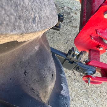 New Holland Refused Warranty on My Tractor Tire Damaged by Field Stone