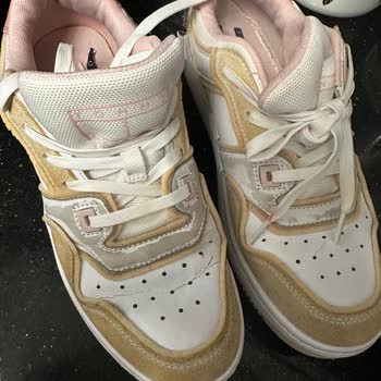 Tommy Hilfiger Shoes Have Peeling Leather and Faded Color