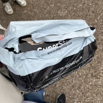 SuperStep Delivered Gift Shoes in Damaged Box with Cigarette Marks