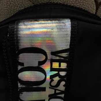 Versace Crossbody Bag Surface Damaged After Minimal Use, Refund Denied