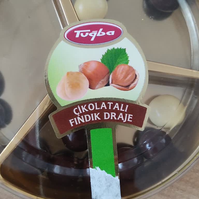 Güvenilir Markada Büyük Hayal Kırıklığı: Çikolatalı Draje İçinden Kıl Çıktı