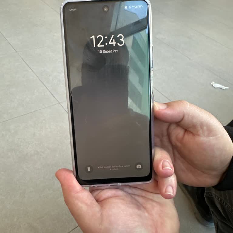 Kilit Ekranı Sorunu: İstenmeyen Fener Ve Kamera Açılması