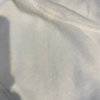 Columbia Sweatshirt'te Bariz Kumaş Hatası