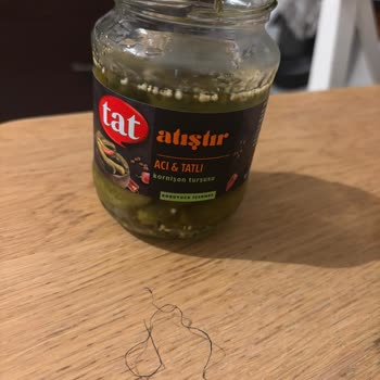 Tat Turşu İçinde Metal Tel Şoku