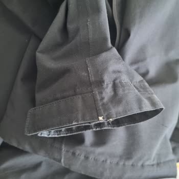 Reparación bajo garantía rechazada por The North Face, solicito solución