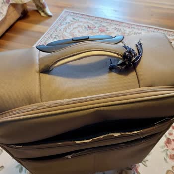 American Tourister Suitcase Coating Peeling—Denied Service at Viaport Samsonite