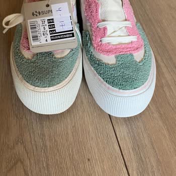 Superga, zapatos enviados usados, solicito reembolso