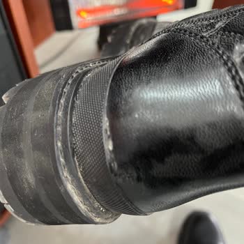 Guess Shoes Started Peeling and Tearing Within a Week, Lack Quality