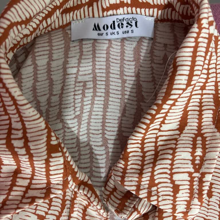 Yıkama Talimatına Uygun Yıkanan Gömlek Küçüldü