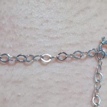 Cambio de cadena de collar de oro de Storks insatisfactorio