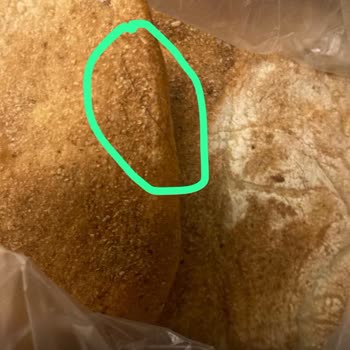 Şok Marketler'de Hijyen Skandalı: Ramazan Pidesinden Çıkan Kıl!