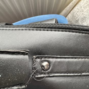 Yırtılan Çanta Kulpuyla Bitmeyen Çile