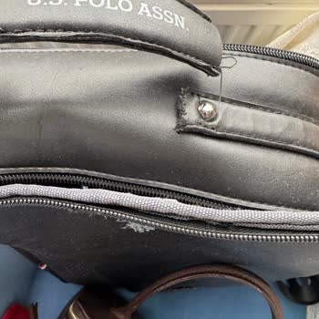 Yırtılan Çanta Kulpuyla Bitmeyen Çile