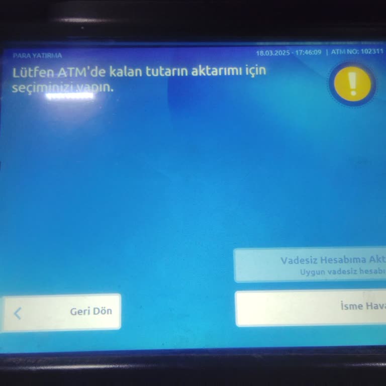 ATM'de Sıkışan Para Ve Çözüm Beklentisi