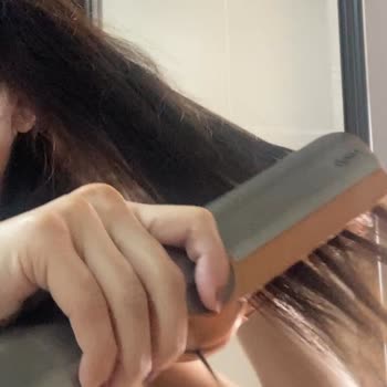 My Dyson Airstrait Burned and Split My Hair Despite Low Heat Promise