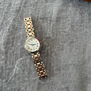 Tissot Bellissima: Внутри пылинка, прошу замену