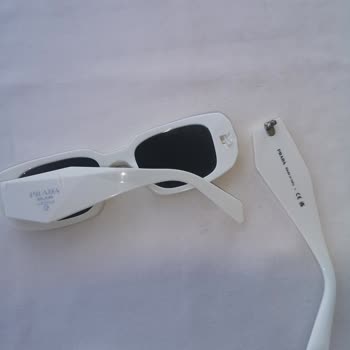 Prada Brille 4 Tage nach Kauf beschädigt, unzureichende Untersuchung und Ablehnung