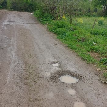 Ünye Belediyesi Bayramca Mahallesi'nde Yol Çilesi: Yağmurda Gölete Dönüyor!