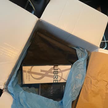 Recibí perfume Yves Saint Laurent abierto, solicito verificación de autenticidad