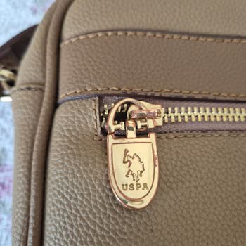 U. S. Polo Assn. Çantanın Metal Aksamı Kısa Sürede Karardı, Hayal Kırıklığı Yaşadım!