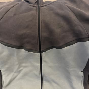 My Nike Tech Set Faded After One Wash and They Refused to Replace It