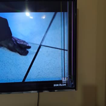 Garantili TVde Ekran Çizikleri İçin Ücret Talebi